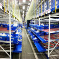 Carton Flow Through Gravity Shelf for Warehouse Storage